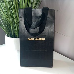 Empty Saint Laurent paper bag.